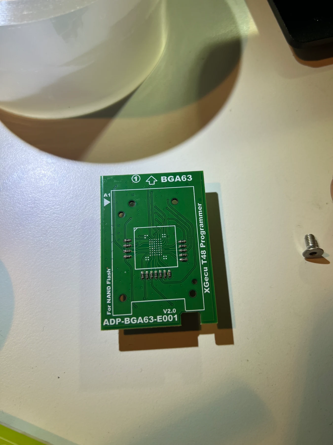 The empty solder-down BGA63 adapter board