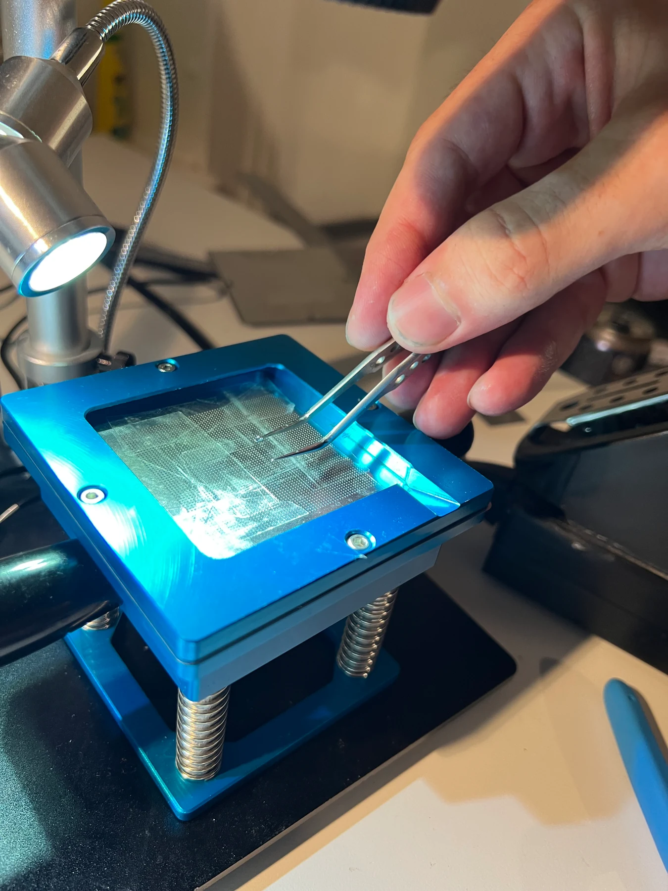 Distributing solder balls across the BGA stencil